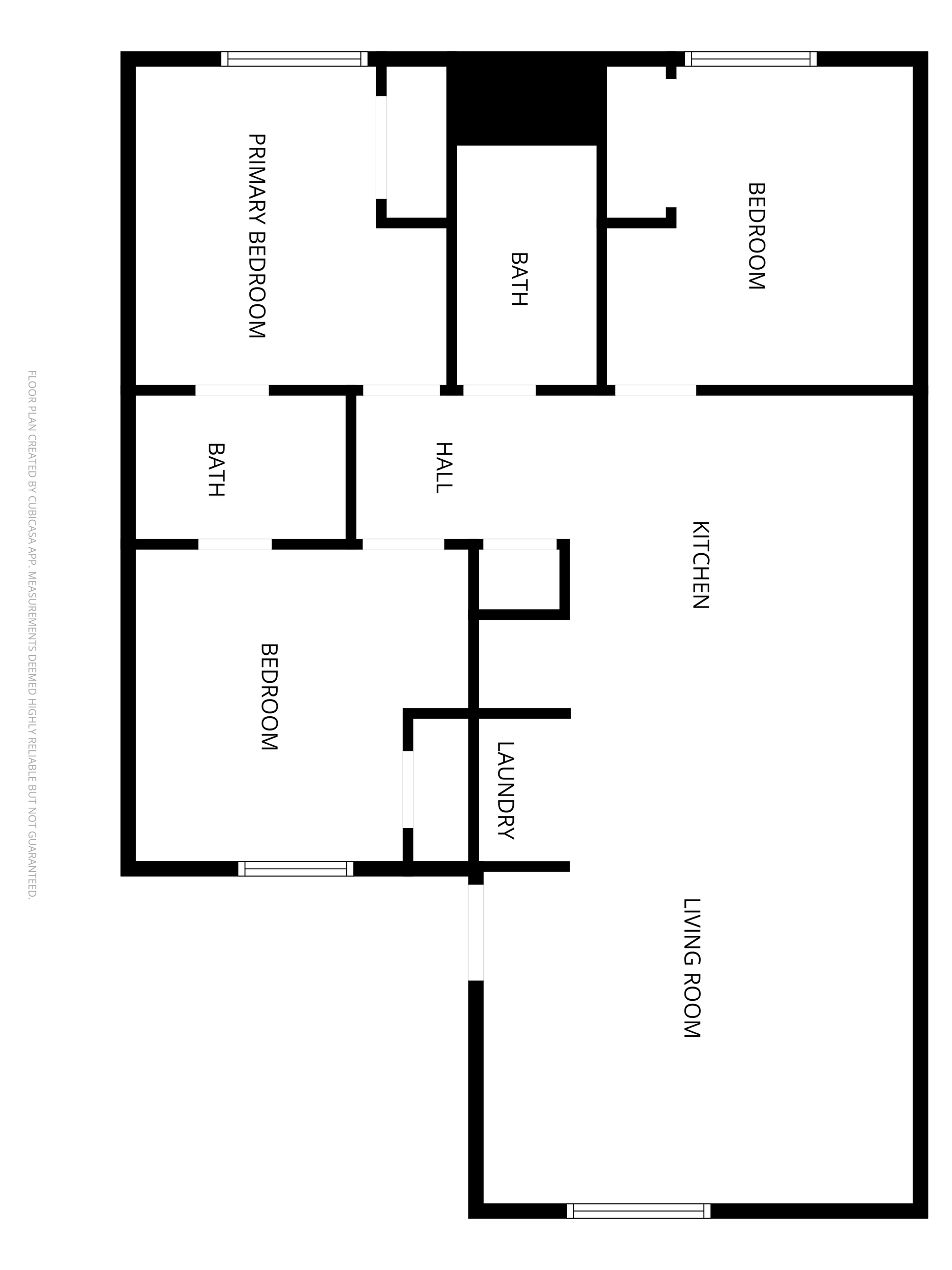 Floor plan of a house showing a living room, kitchen, laundry room, three bedrooms, two bathrooms, a hall, and a primary bedroom.