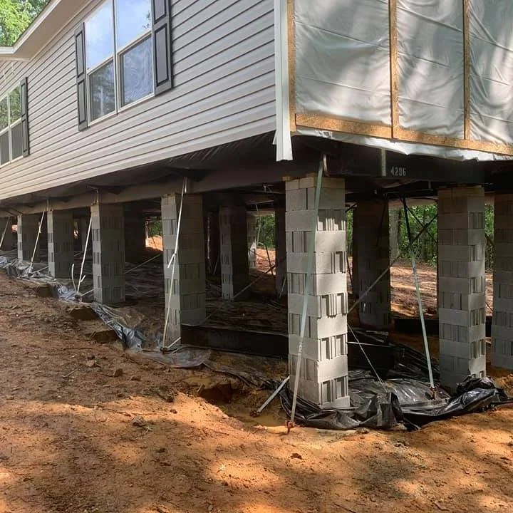 mobile home sitting on cinderblocks