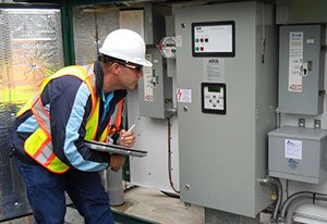 electrician inspecting a panel