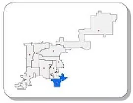 Map of a building layout with various rooms and corridors, highlighted in blue at the bottom.