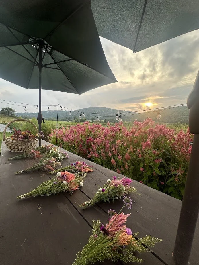 Flowers on table in field.jpg