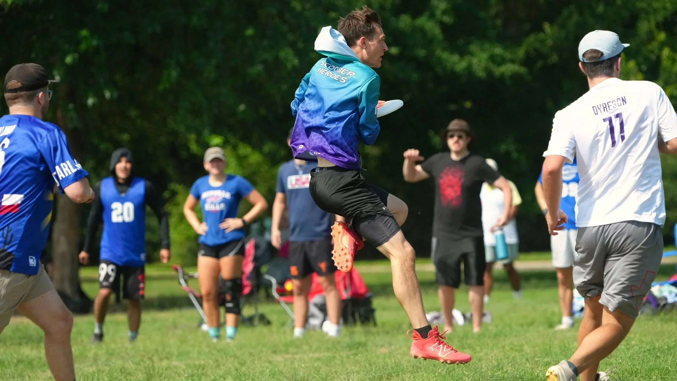 Sugar High's Caleb Lacefield leaps into the endzone for a Callahan against Risky Business during Two Finger in 2025.