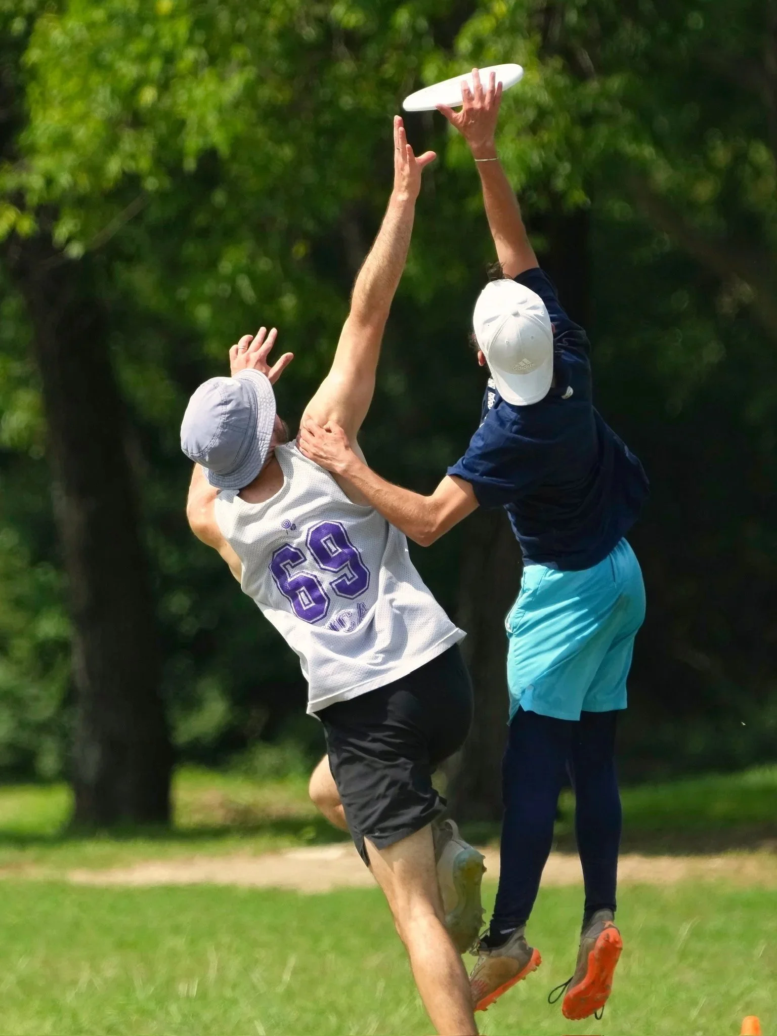 Sugar High's Will Brinkmeyer skies an opposing player for a block during a game at Two Finger in 2025.