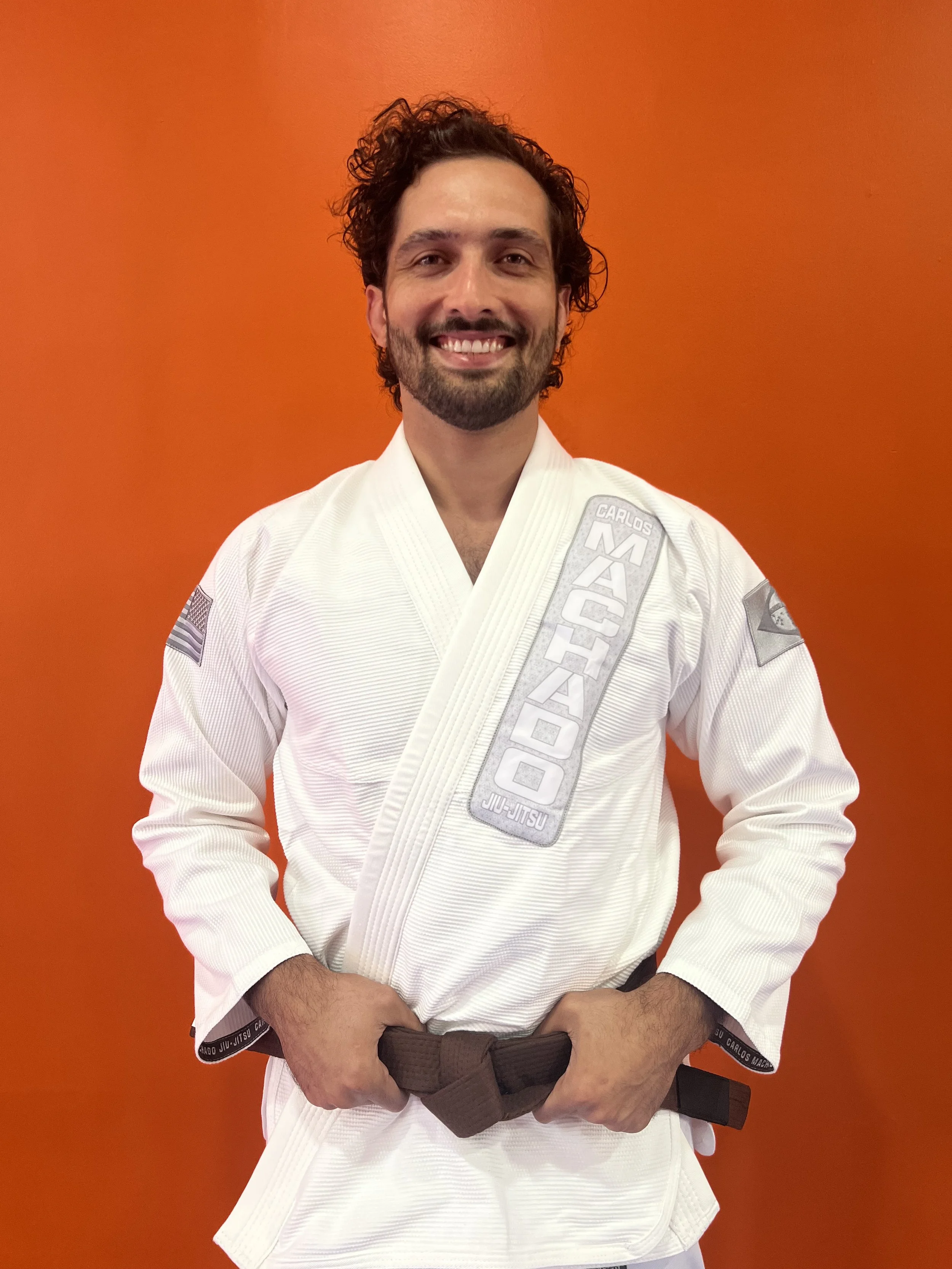 Brooklyn Heights Jiu Jitsu Instructor in a white Gi, representing out world class lineage.