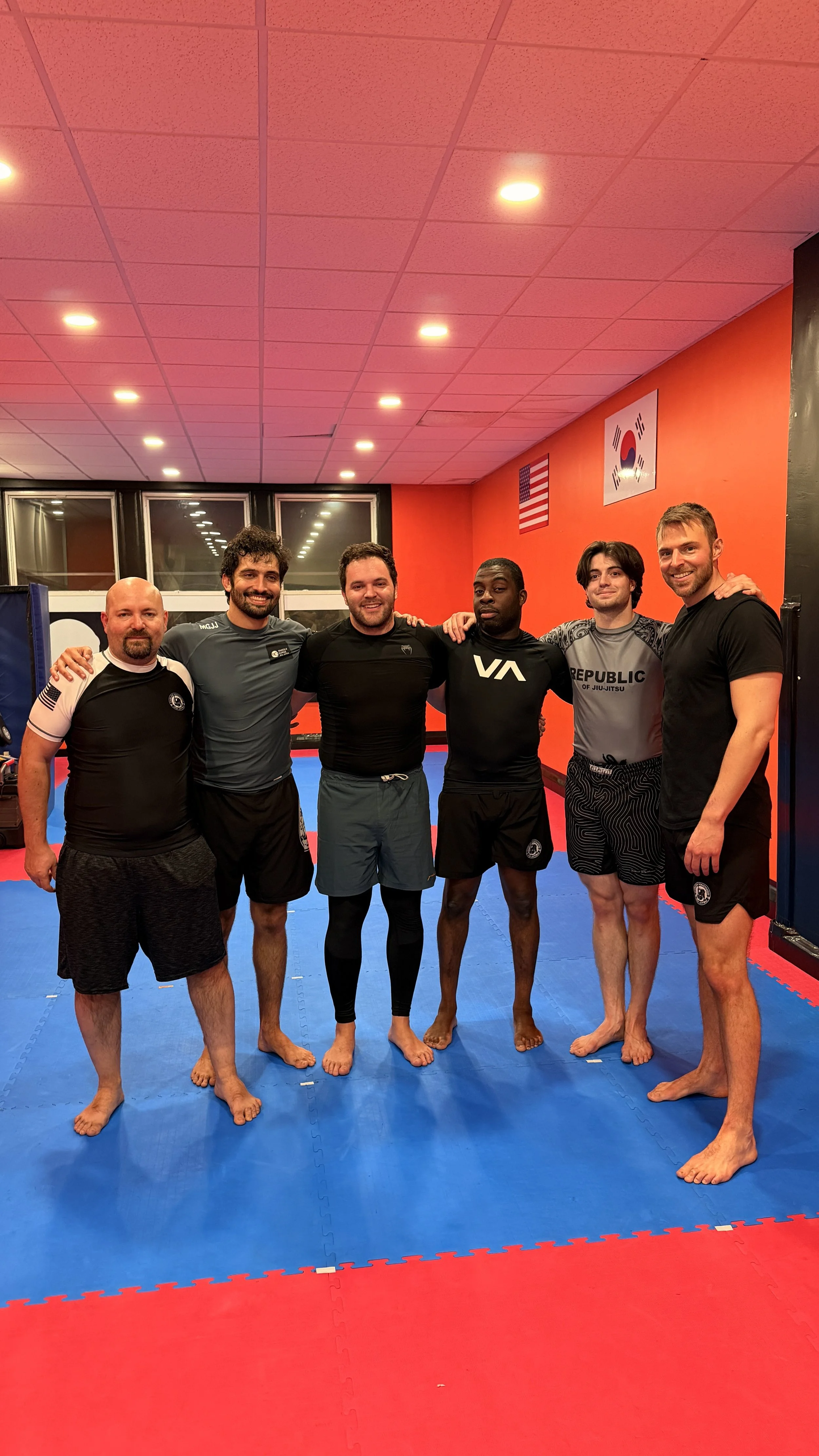 Members of Brooklyn Heights Jiu Jitsu taking a picture together after evening class