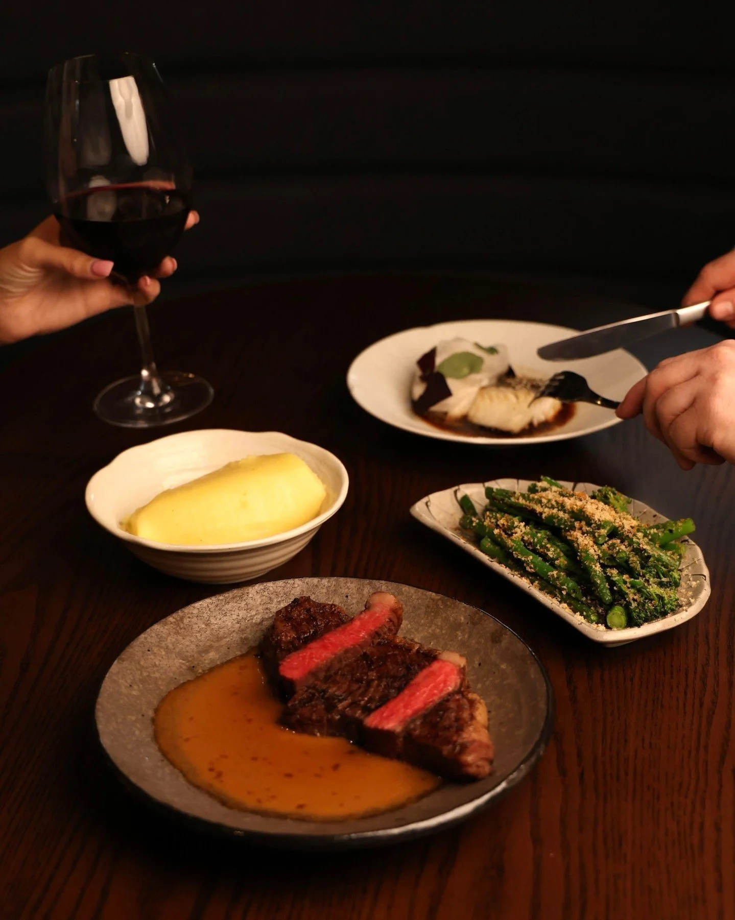 Go big for our Grand Opening weekend. 🥩 Our steak range is our obsession, tender, marbled, and flame-kissed to perfection. Designed to be shared. 

Ft. 
7+ Striploin 300g served alongside Truffled Potato Mash and Wood-Fired Greens.