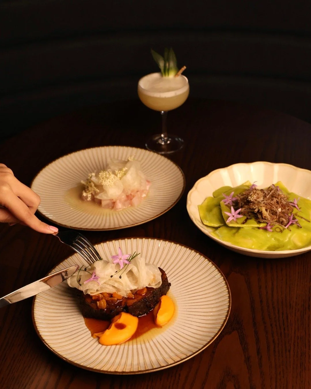 Discover a masterclass ❤️&zwj;🔥 in smoke and texture this weekend. Immerse yourself in an elegant dining experience where artisanal cocktails meet fire-kissed plates. 🔥 

Ft. 
Slow Roasted Pork Neck , Crab &amp; Prawn Ravioli and White Fish Crudo.