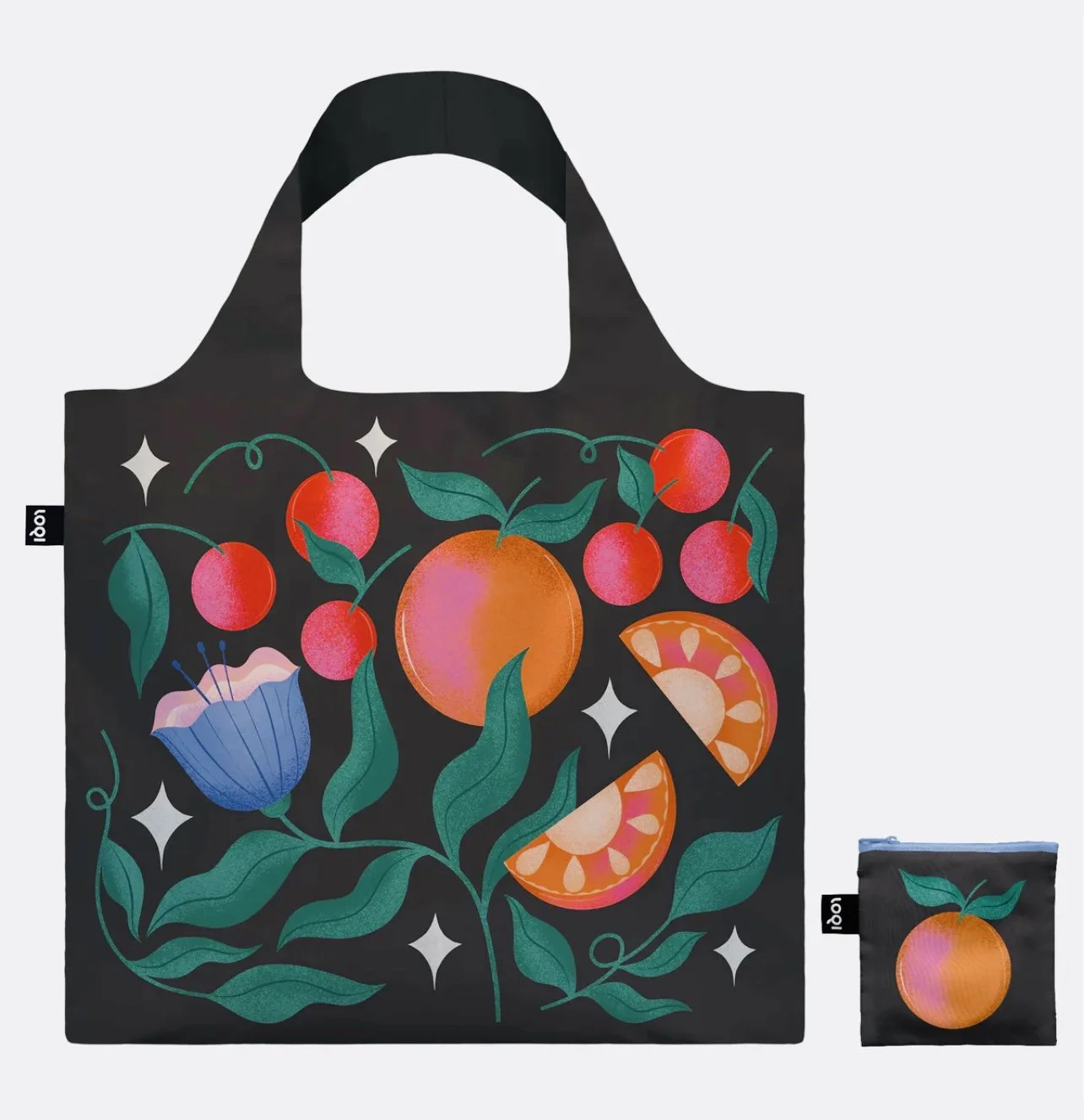 A black reusable shopping bag with colorful fruit and floral designs, including cherries, an orange, orange slices, a blue flower, green leaves, and white star-like accents, with a smaller matching pouch.