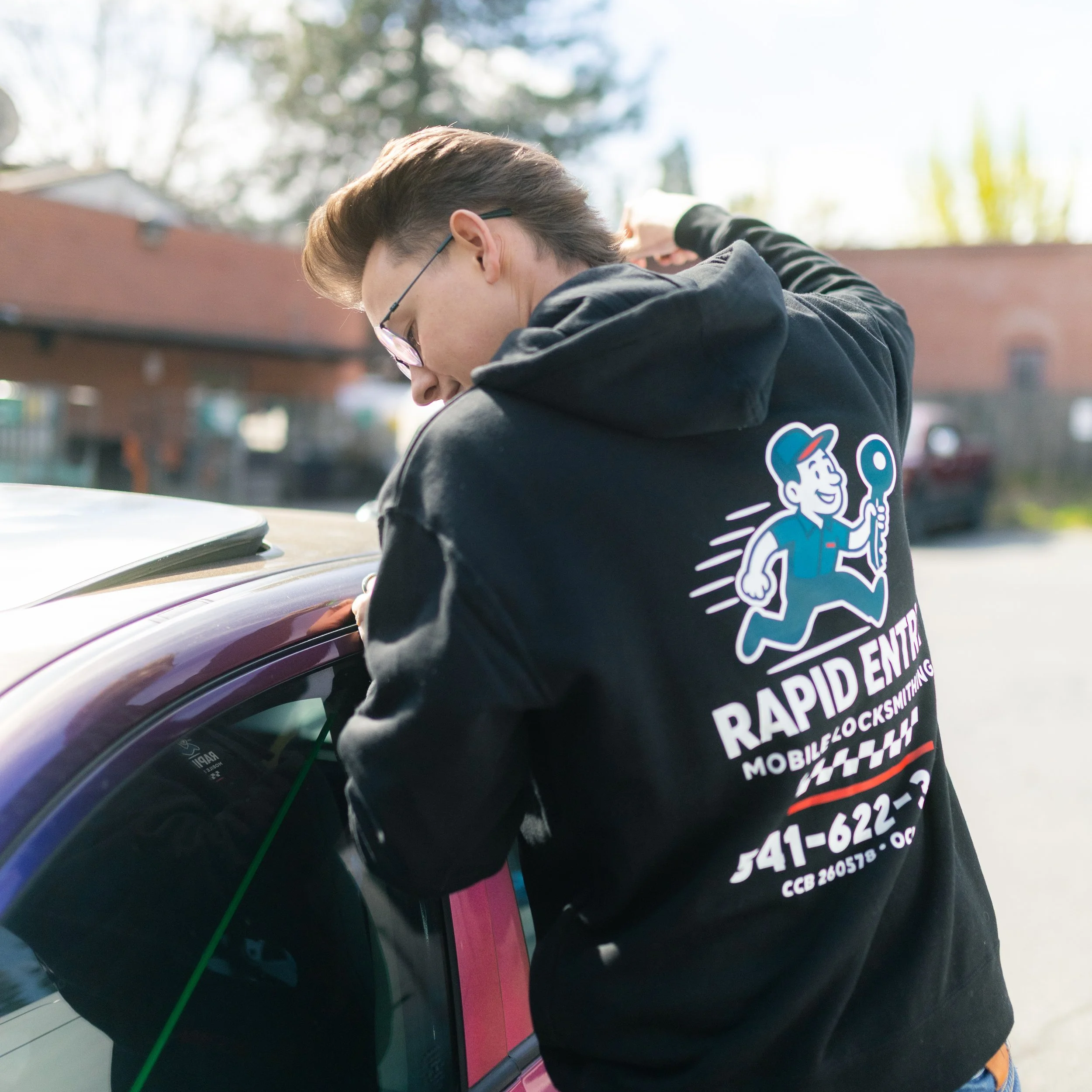Owner, Robert, opening a car door.