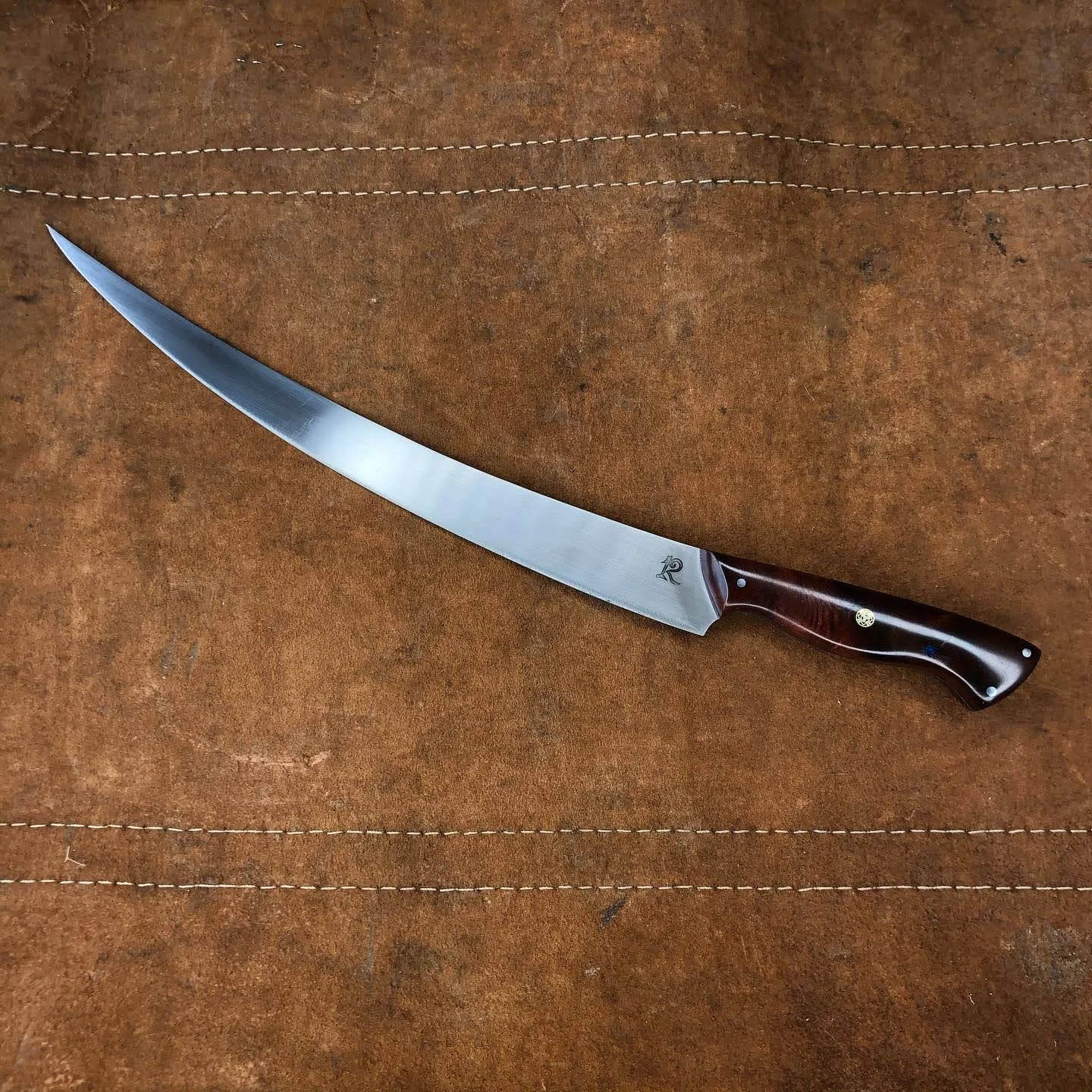 12” filet. Custom order from an arborist for his retirement. Made from one of his saw blades and handle of customer provided manzanita wood (2023)