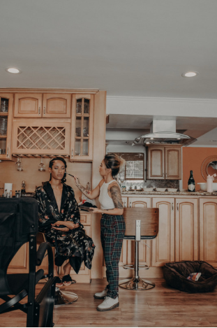 Rachelle and a model engaging in a conversation.