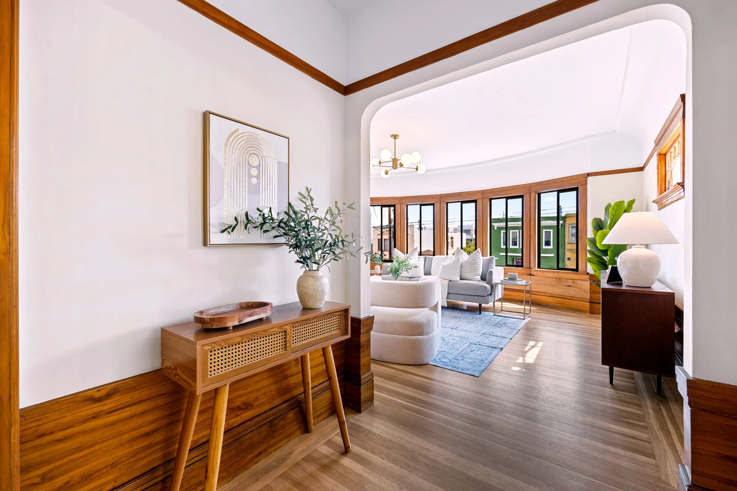 Entryway view into staged San Francisco living room after pre-listing renovation and preparation