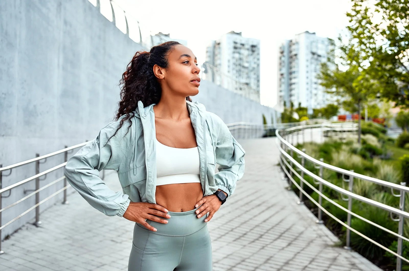 A woman exercising in high end performance running apparel