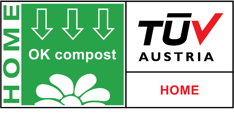 Environmental certification label indicating compostable material, TÜV Austria certification, with the words 'HOME' and 'OK compost' and green arrows pointing downward.