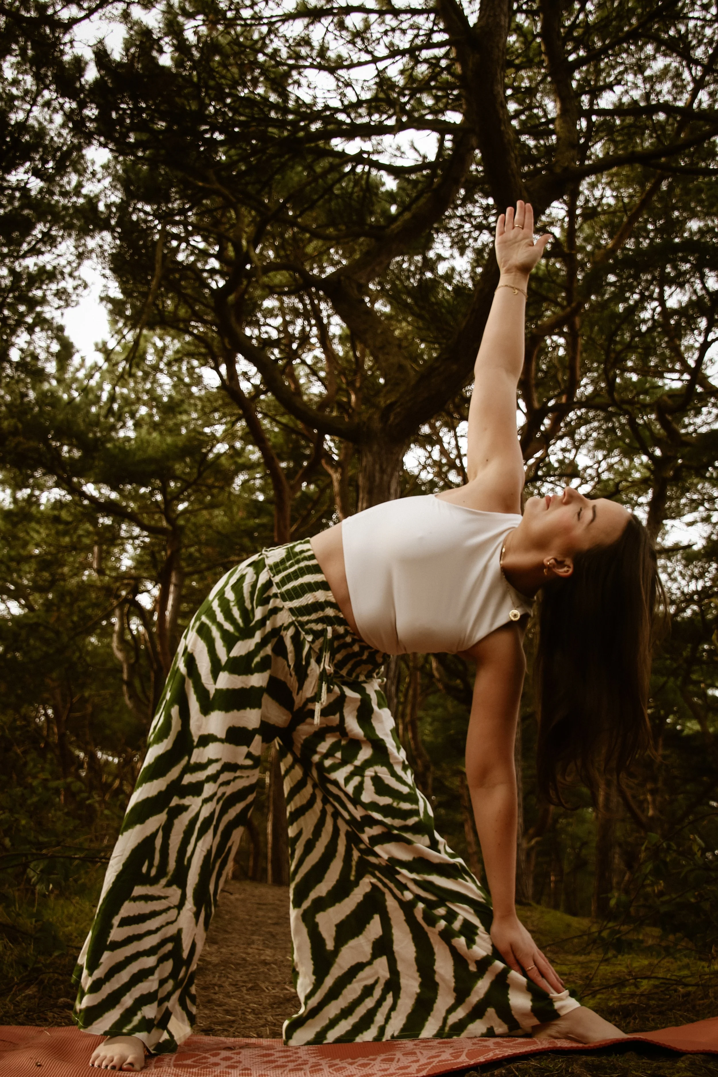 Stacey White Ways of Being Trikonasana in the forest