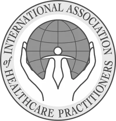 Logo of the International Association of Healthcare Practitioners, featuring a globe held by two hands with a stylized human figure inside.