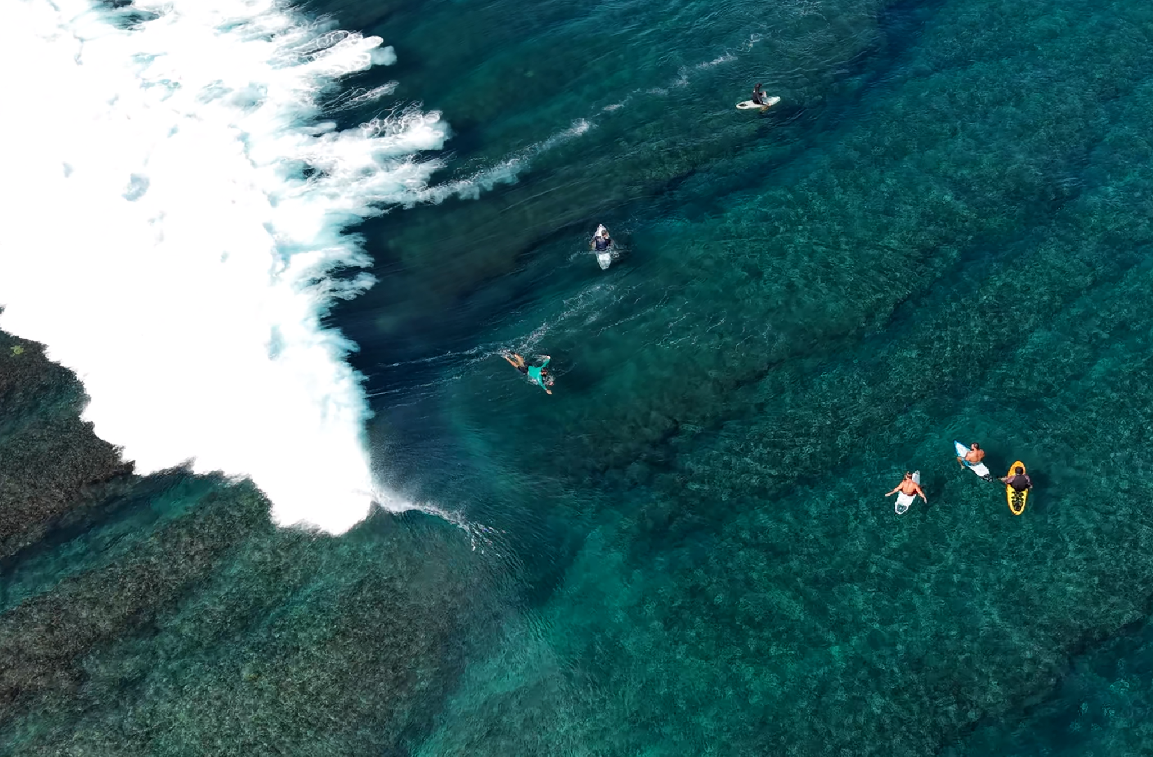 School of barrels Mentawai surf trip onboard experience reef break in mentawai