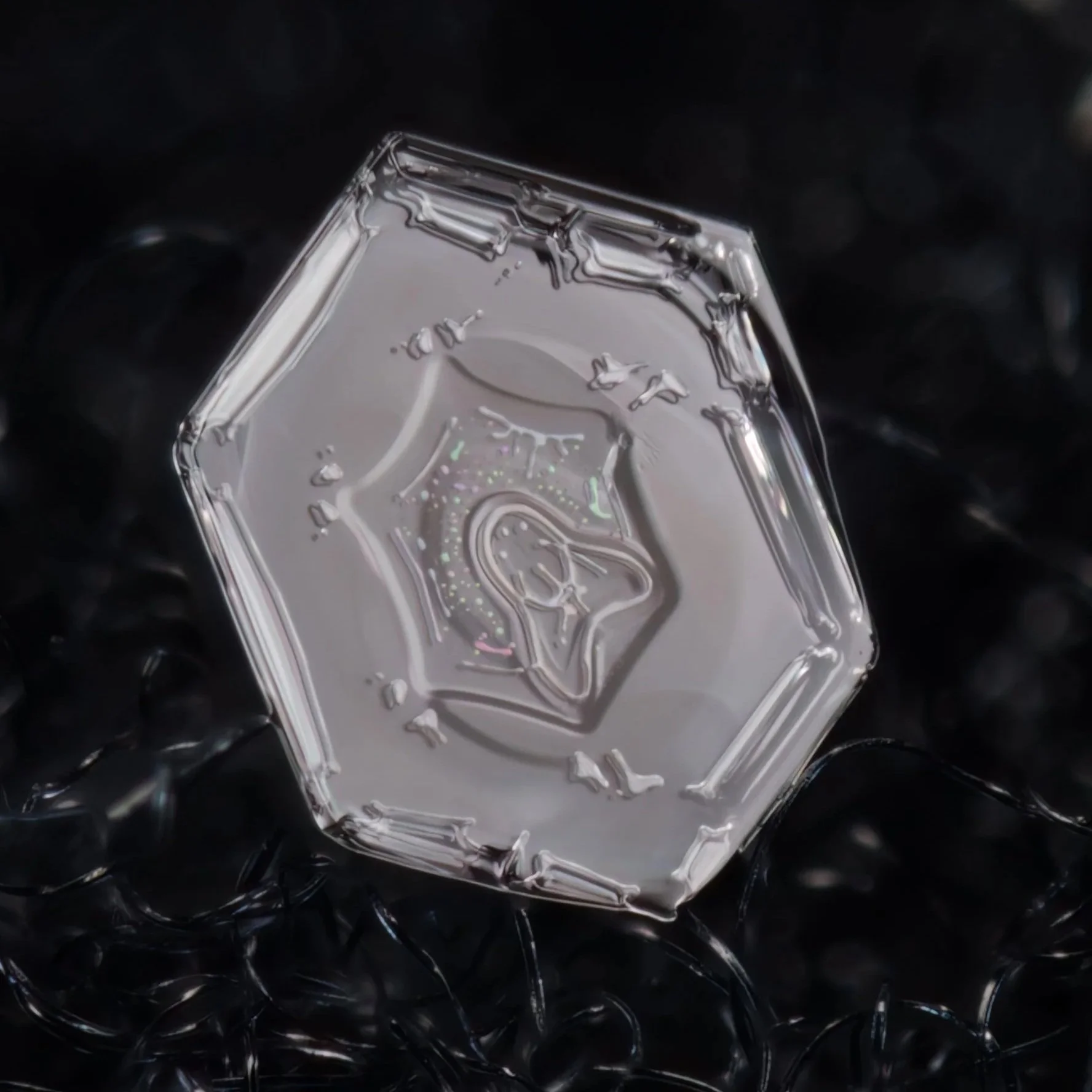 Macro photograph of a rare simple plate snowflake with visible color refraction captured in Oulu, Finland.