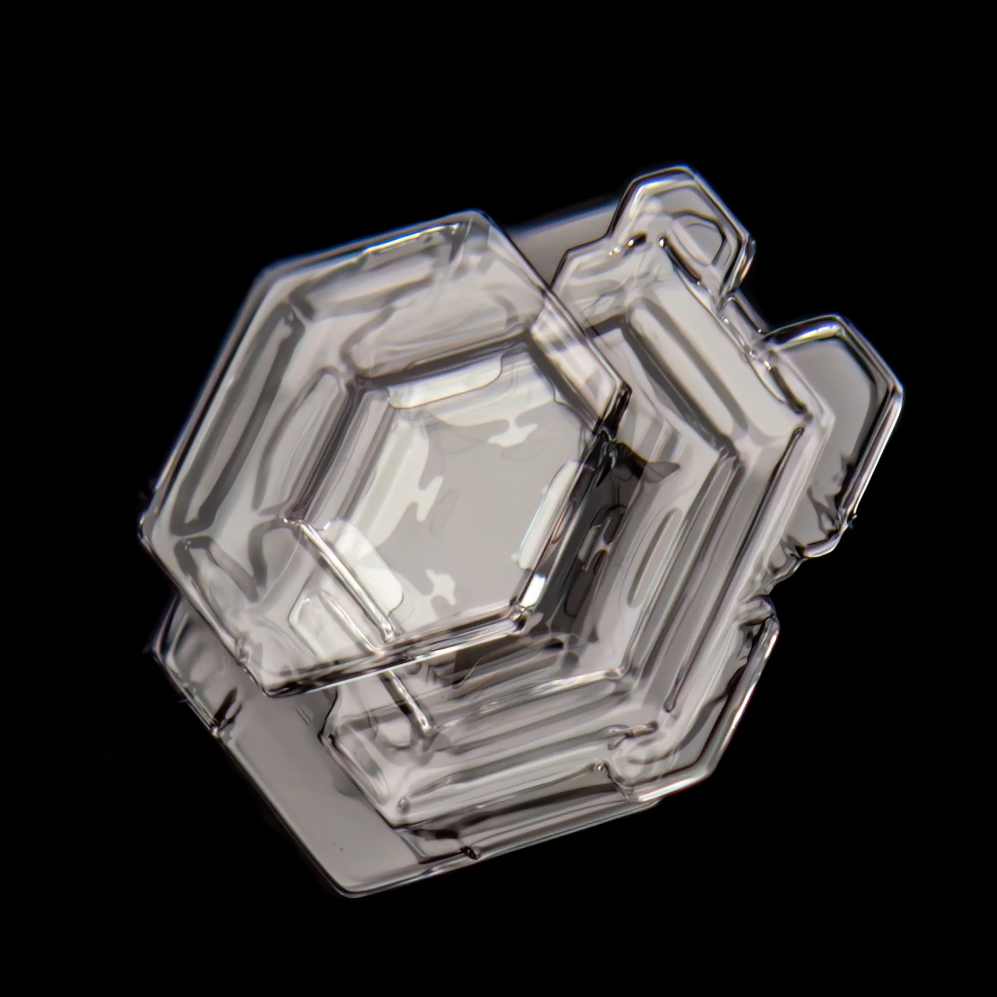 Macro photograph of a small plate snow crystals piled up on top of each other. 
