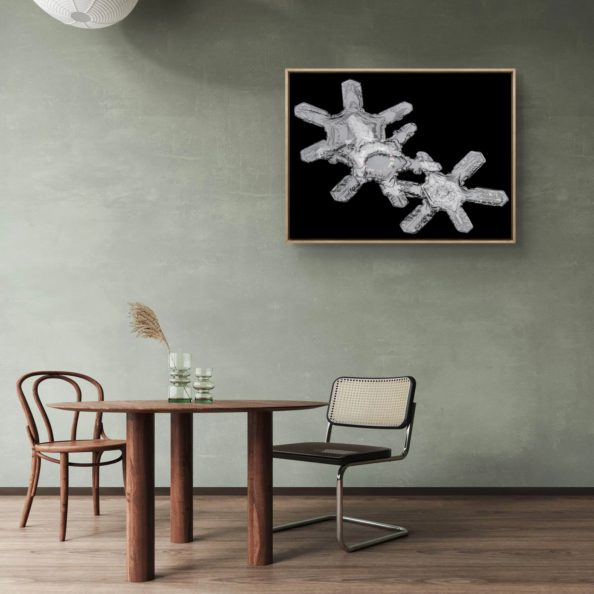 Fine art snowflake image with three individual snowflakes overlapping each other.