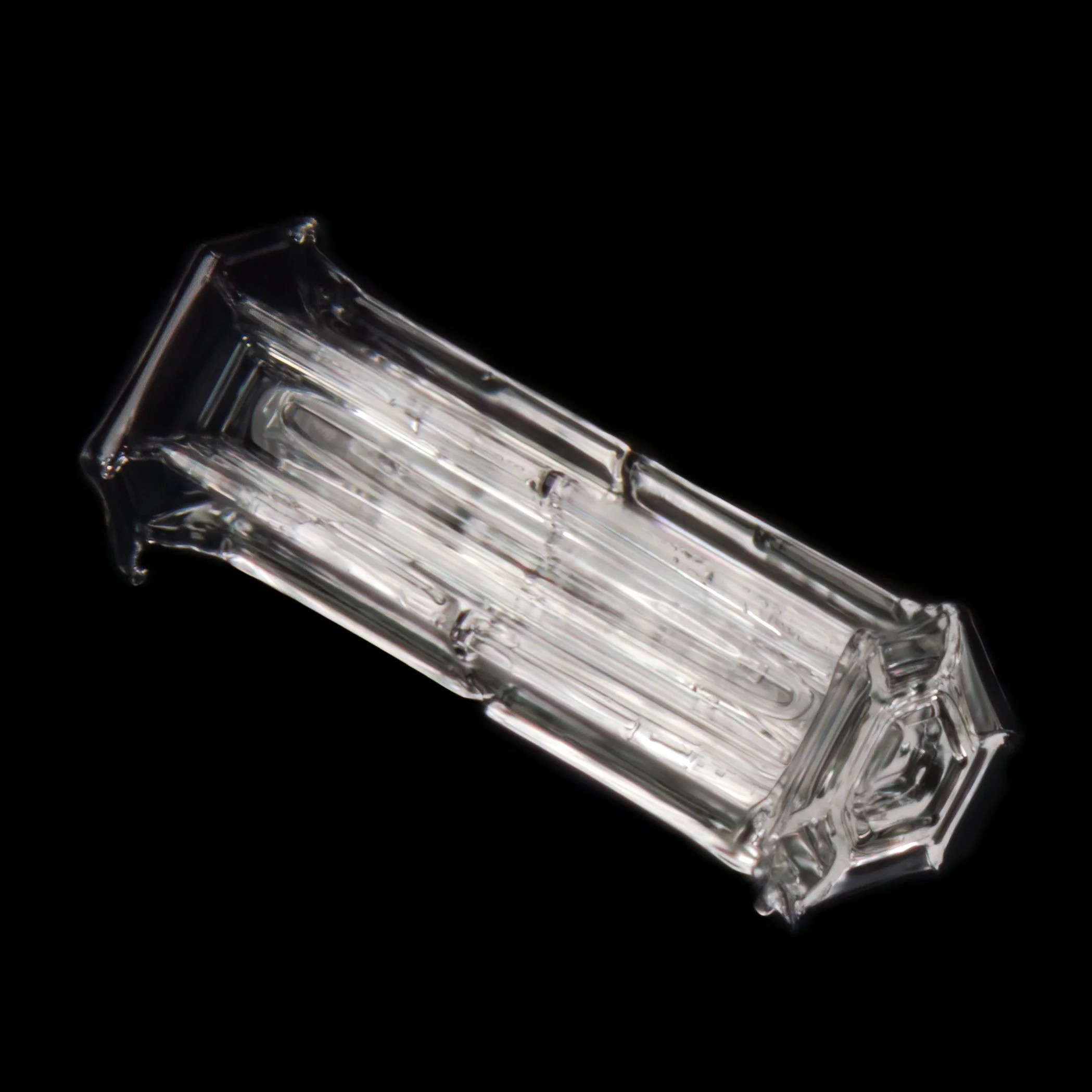 Macro photograph of a hollow column snow crystal.