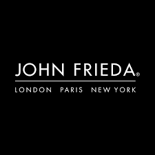 Black background with white text displaying 'JOHN FRIEDA' and 'LONDON PARIS NEW YORK' below.