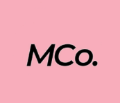 Pink background with the black text 'MCo.' centered
