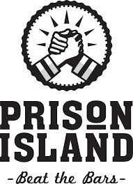 Logo for Prison Island featuring two fists clasped together inside a gear with the tagline 'Beat the Bars'.