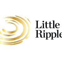 A close-up of a gold-colored Christmas or holiday ribbon spool.