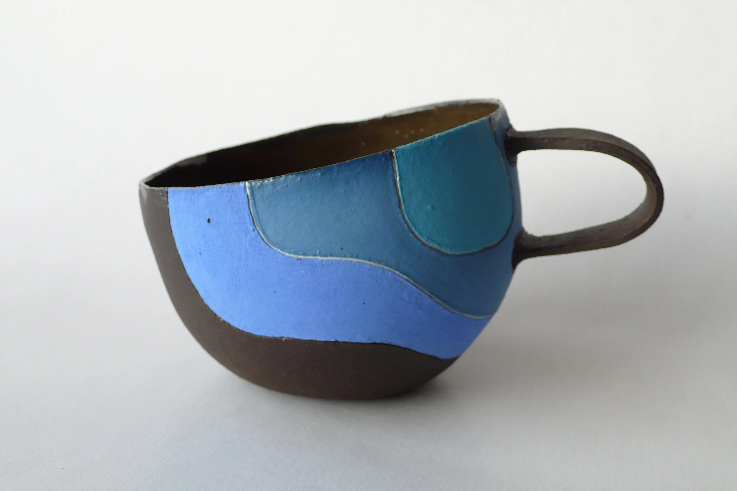Contemporary hand-built black stoneware cup with rhythmic inlaid slips from the Celestial Rhythm series by Marisa Iona.