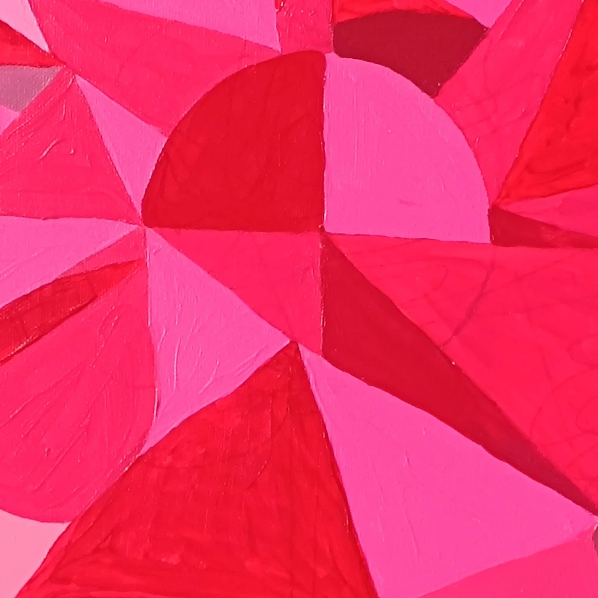 Macro detail of the 1m x 1m painting The Pulse by Marisa Iona, focusing on the vibrant red and neon pink geometric triangles.