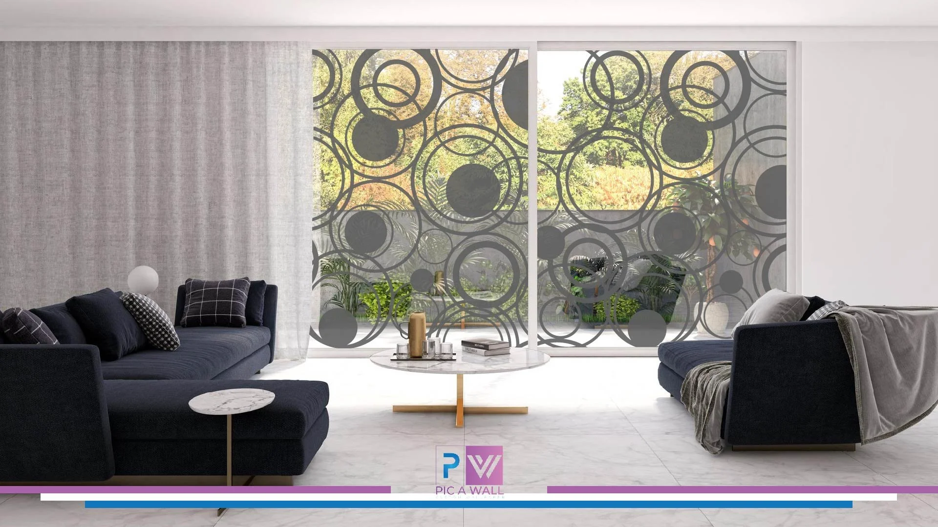 Modern living room with black sofas, a white marble coffee table, and large windows with black circle-patterned privacy film, overlooking a garden.