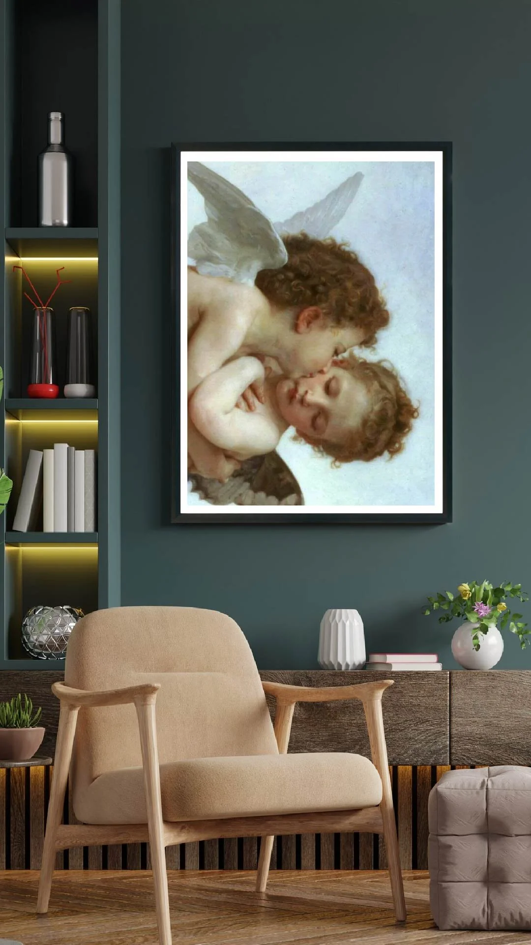 A framed artwork of two cherubs, showing one with curly red hair and angel wings kissing the forehead of a brown-haired girl with curly hair, on a dark green wall in a living room.