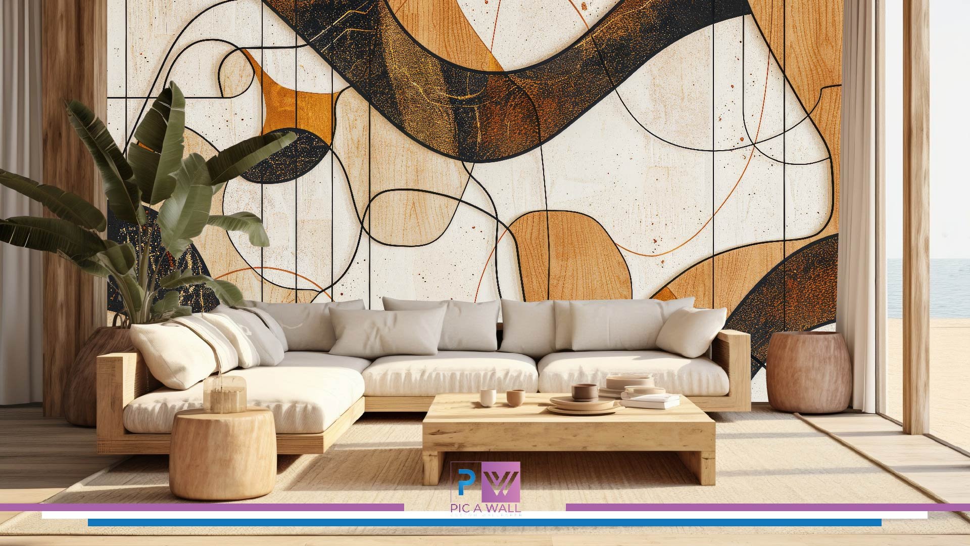 Modern living room with a large white sectional sofa, wooden coffee table, and a large abstract wall art with black, orange, and beige tones. There is a potted plant on the left and a view of the ocean through glass doors on the right.