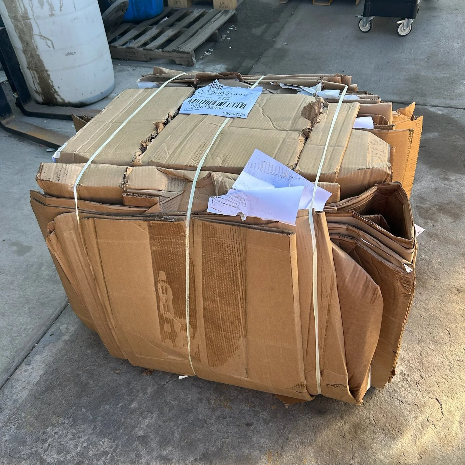 baled cardboard for commercial recycling services reducing waste costs for businesses