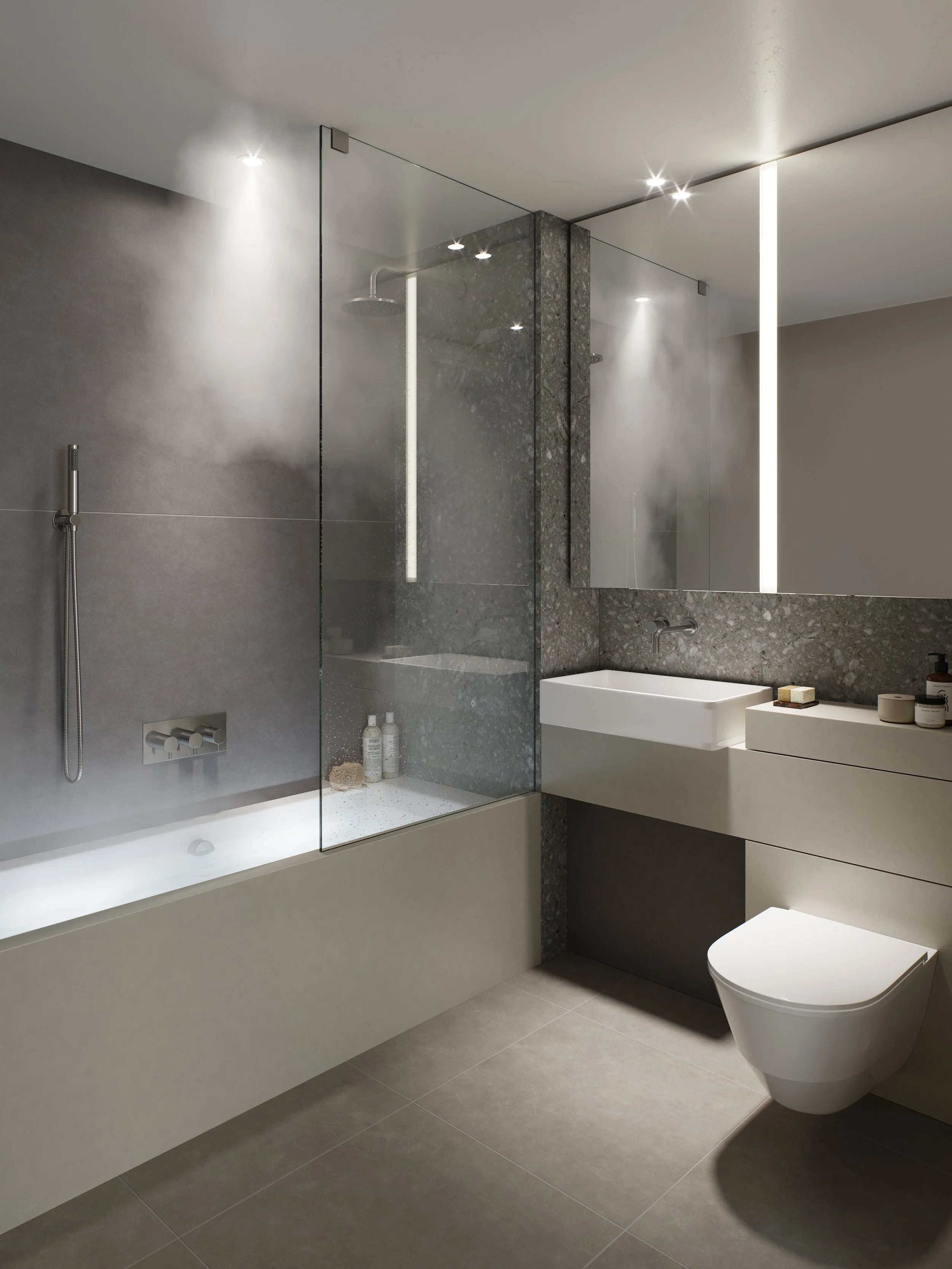 Modern bathroom with a bathtub, glass shower enclosure, white sink, and toilet, featuring gray and white color scheme and minimalist design.