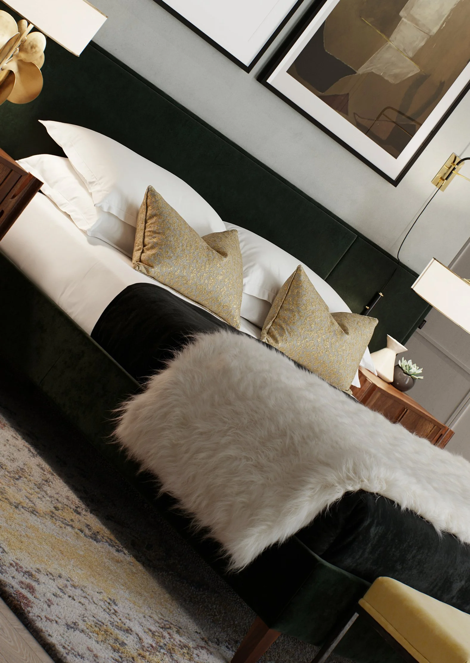 A cozy bedroom with a green upholstered bed, white bedding, and gold-patterned throw pillows. There is a white furry throw and a dark blanket on the bed. The wall behind features artwork, and bedside tables with lamps and decorative items are visible