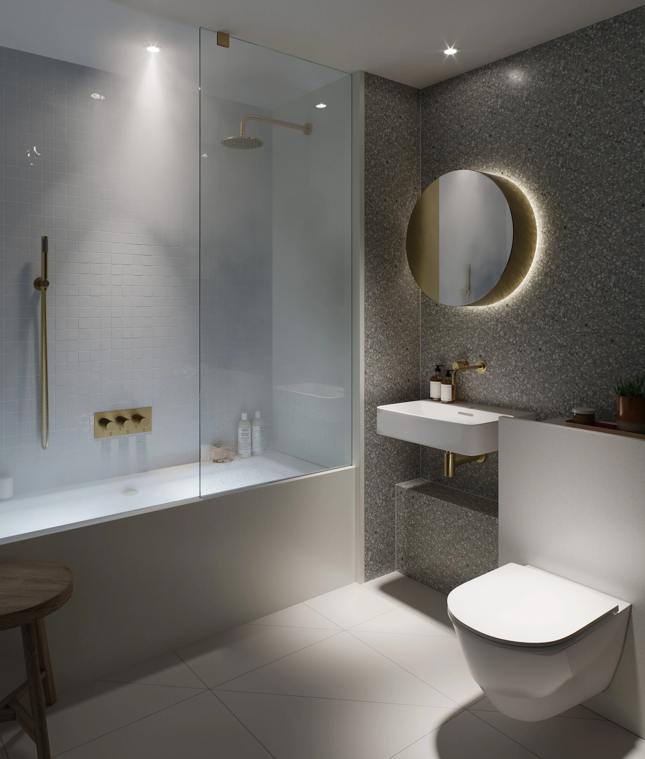 Modern bathroom with a walk-in shower, round mirror with backlighting, wall-mounted sink with gold fixtures, and a toilet.