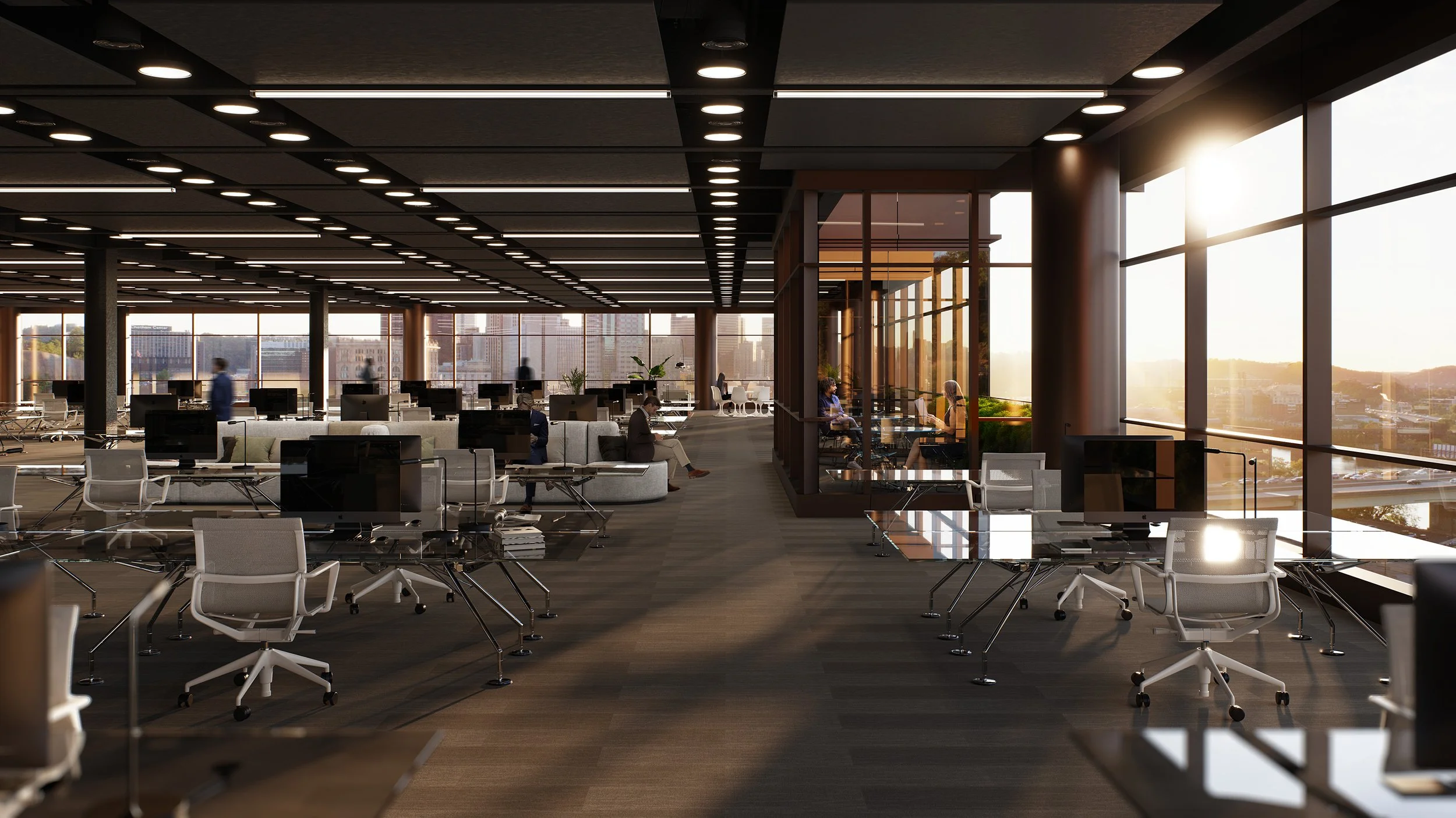 Modern office space with rows of desks, chairs, and computers, large windows letting in natural light, and a city view outside.