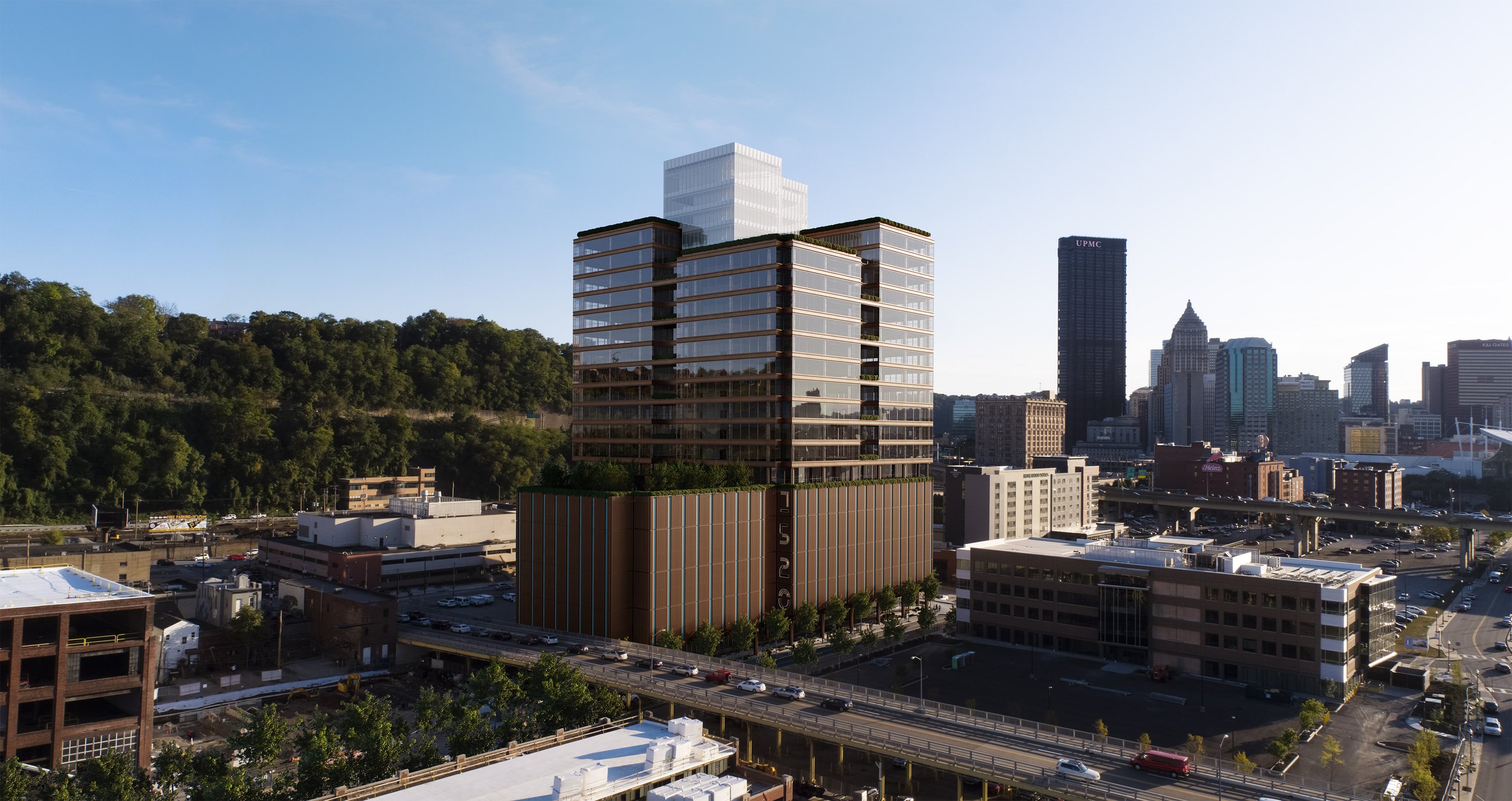 A cityscape with a modern high-rise building in the foreground, surrounded by other skyscrapers and buildings, with a green hill on the left and a highway with vehicles below.