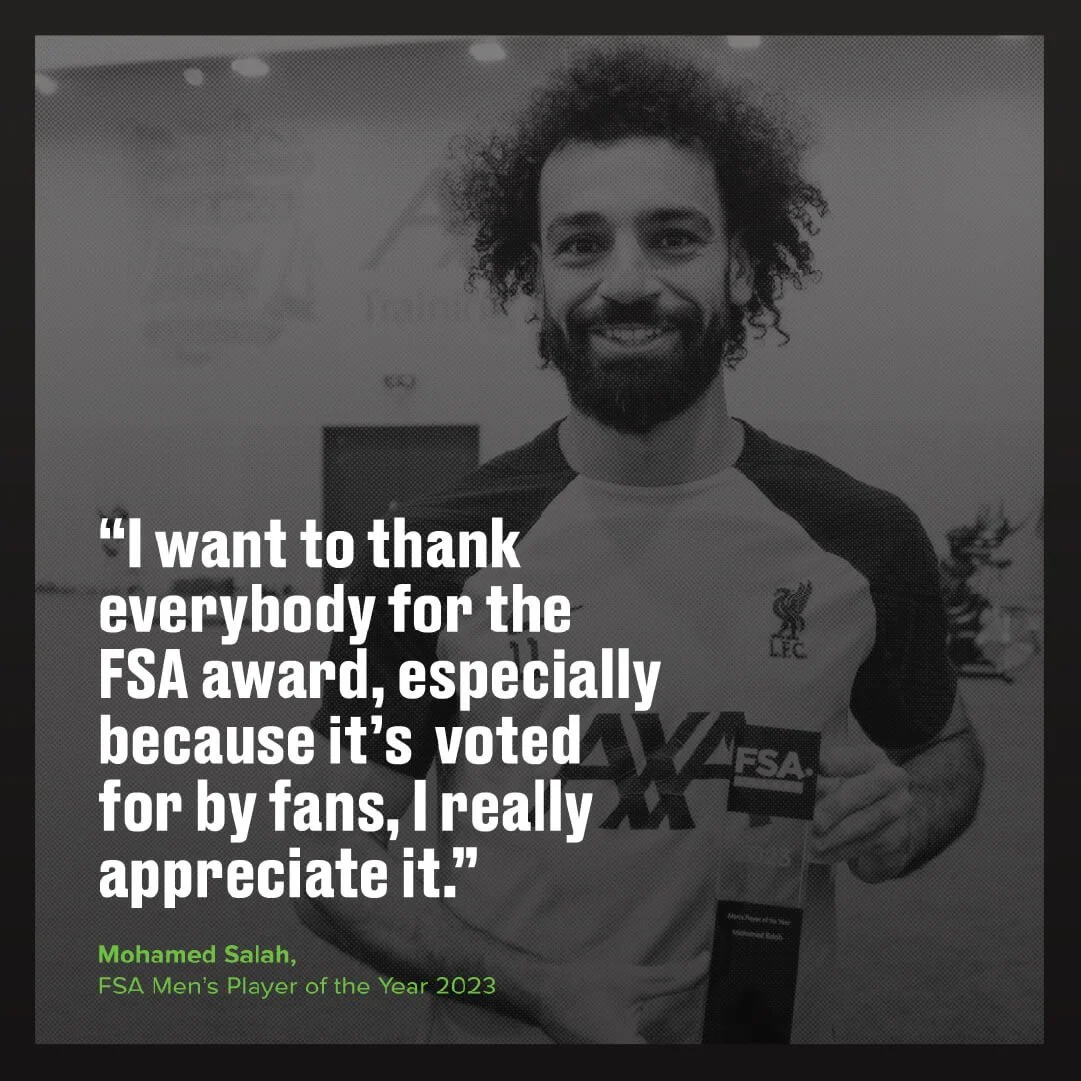 A man with curly hair and a beard smiling, holding a trophy in his right hand, wearing a football jersey with the FC Liverpool logo. The image has the quote: 'I want to thank everybody for the FSA award, especially because it’s voted for by fans, I r
