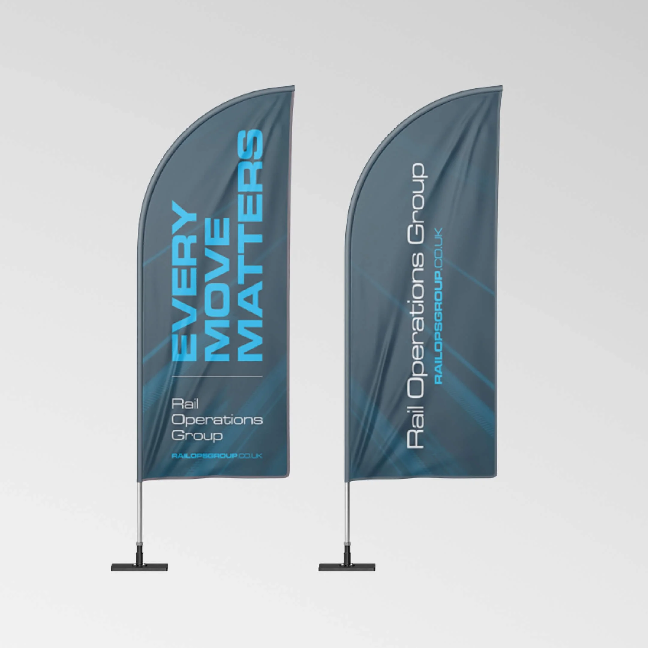 Two blue promotional feather flags with white and blue text for Rail Operations Group, a rail logistics company.