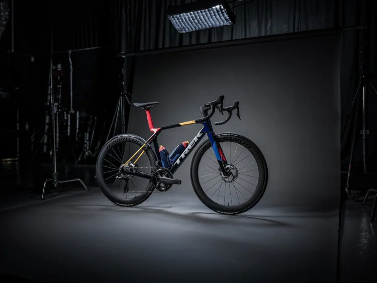 Trek Madone Gen 8 in a dark studio under a single soft light