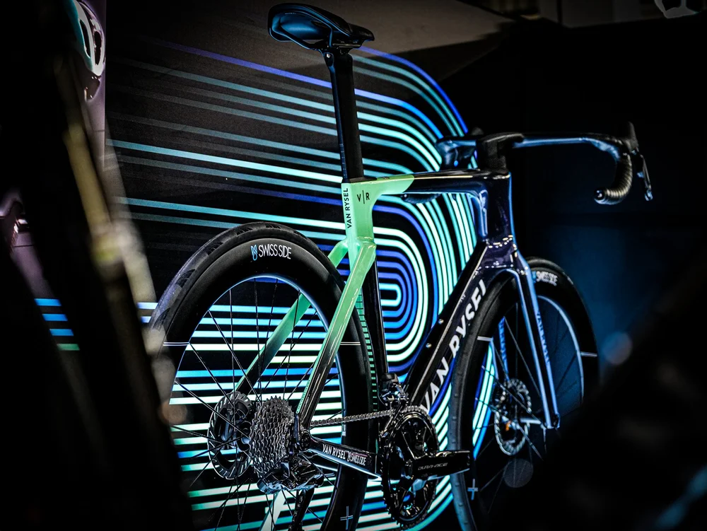 A Cervélo time trial bike under projected blue light