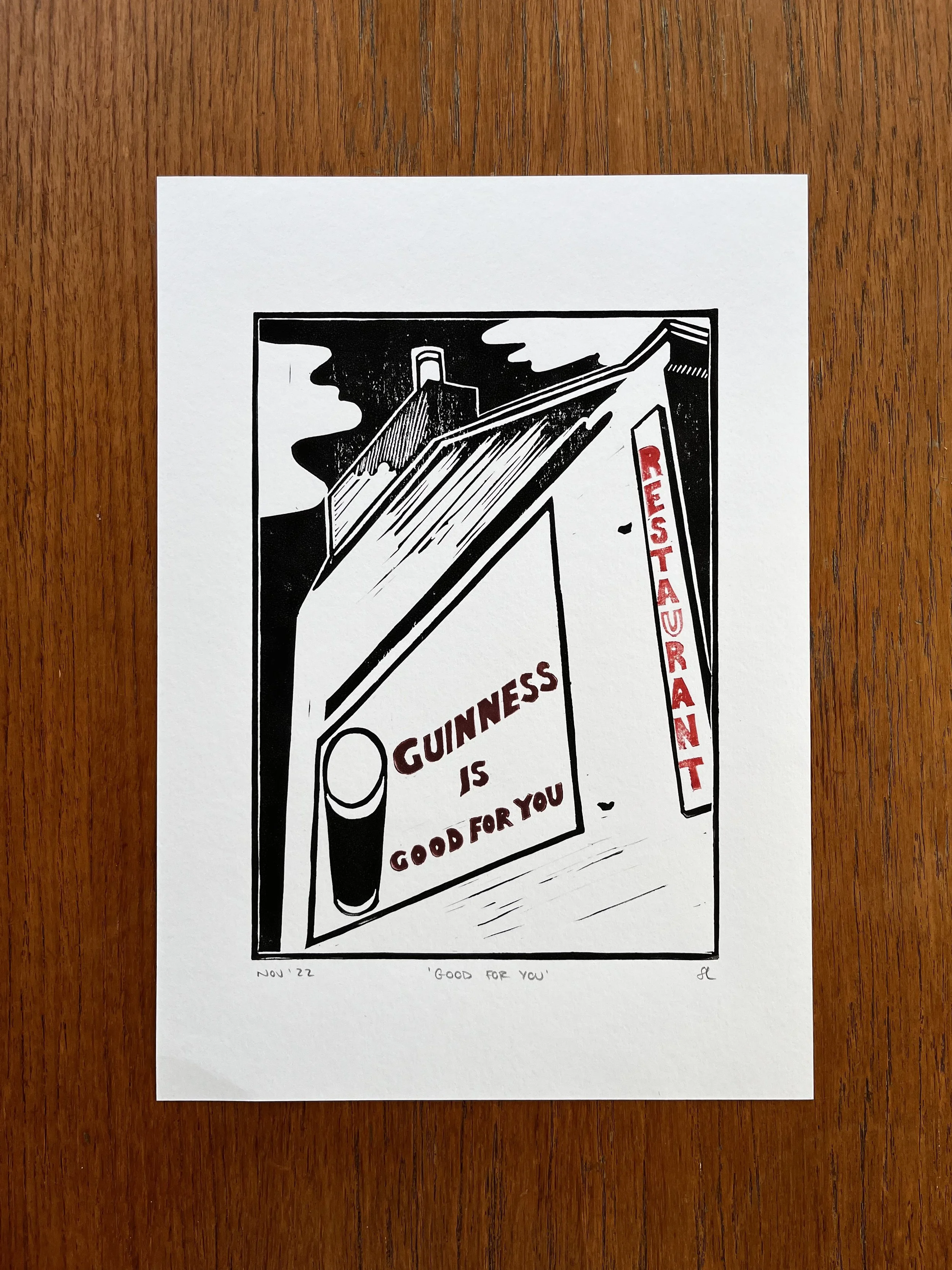 A black and white illustration of a pub scene with a shelf and a signboard that reads 'Guinness is good for you' and a tall sign that says 'Chusai Restaurant' on the side.