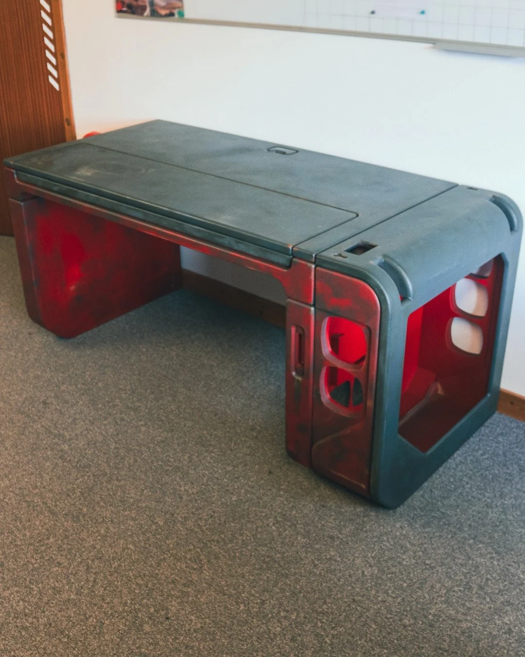 Some builds don&rsquo;t end. They just change form.
This desk started life at Gamescom 2017, part of a CIG stand build. Stripped back, repainted, reassembled and weathered to live permanently in the JRDF office.
A purposeful weathered, grimy finish. 