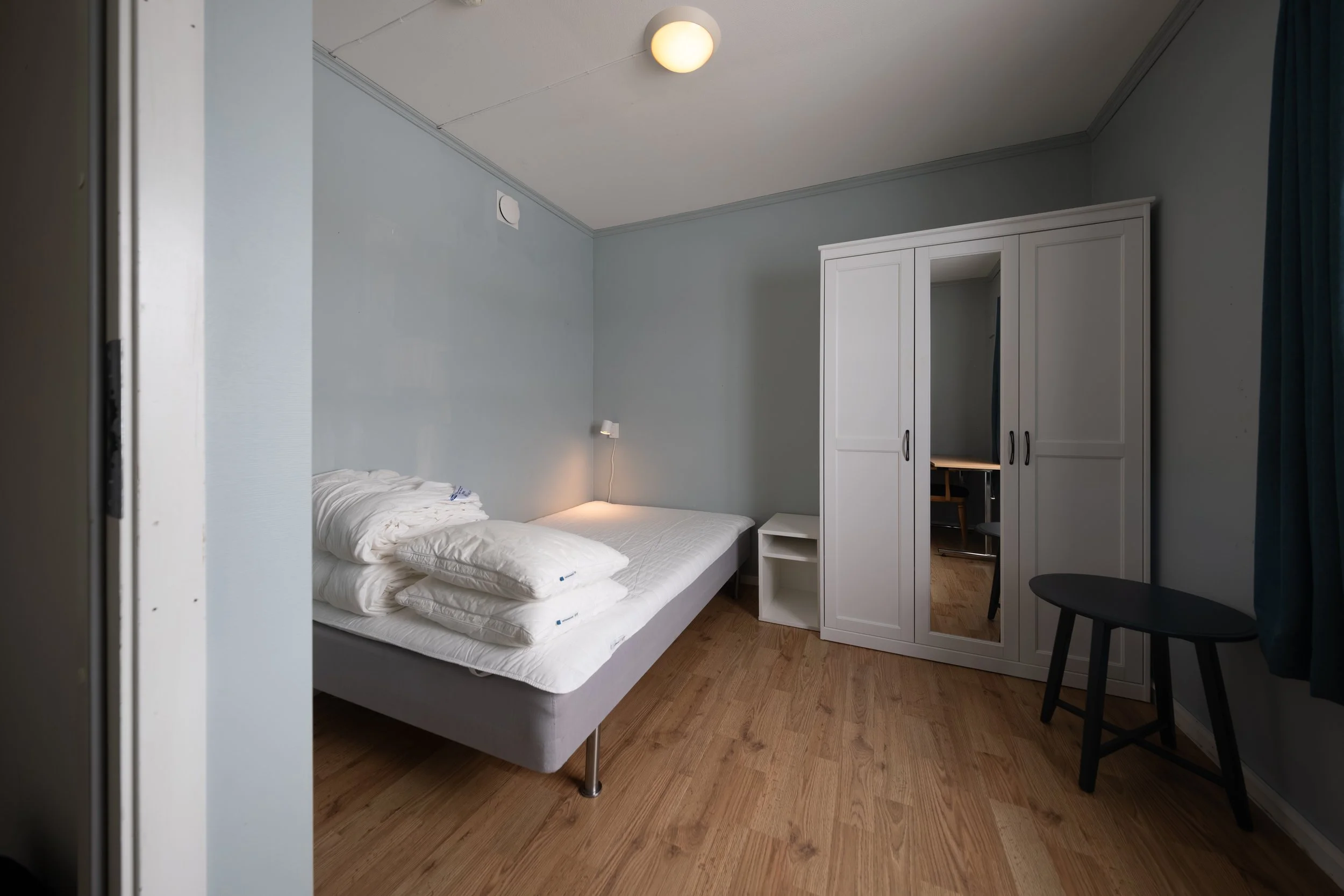 Private rooms with door signs on each door