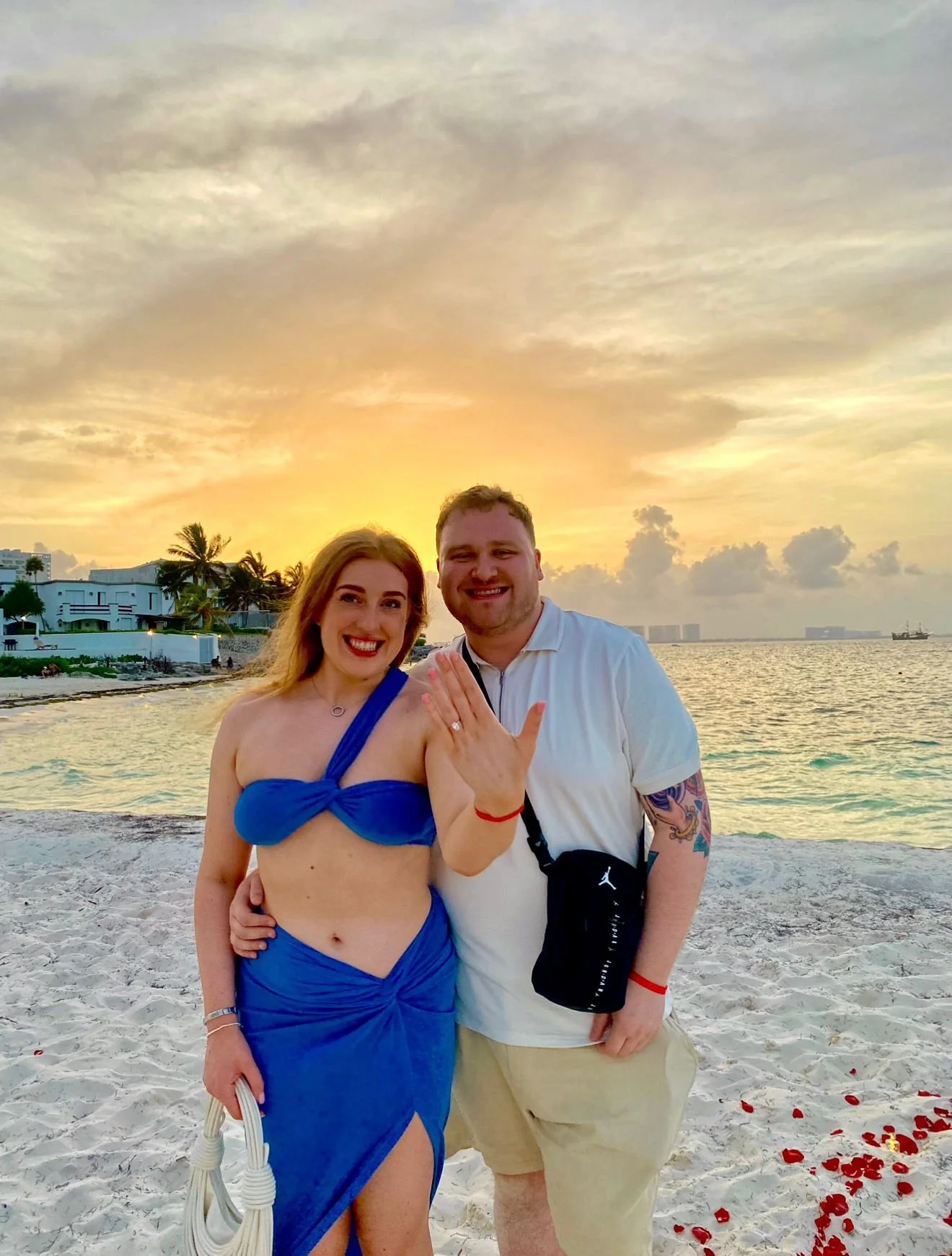 adam and louisa engagement pic beach.jpg