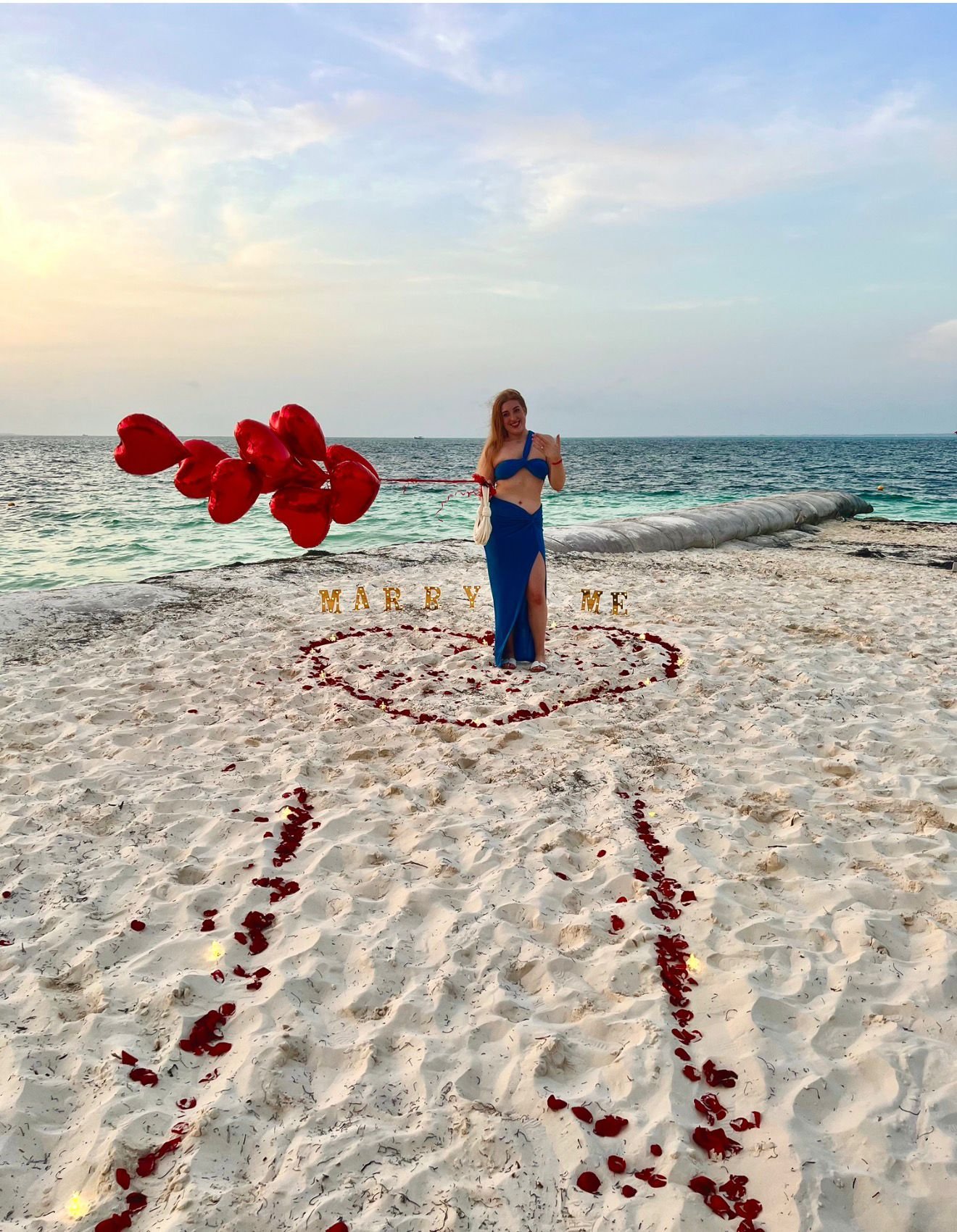 louisa engagement pic beach.jpg