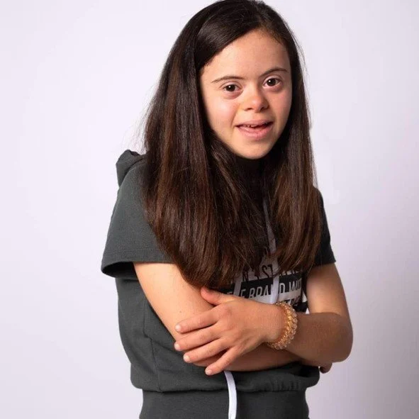  Hannah Micallef:  Hannah Micallef is 23 and a multi-talented artist and proud self-advocate representing the Down’s Syndrome community. She trained for 10 years with Masquerade Malta, earning Level 3 Acting and Level 7 Musical Theatre Trinity of Lon